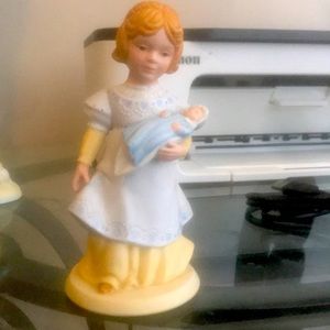 Avon collectible a mothers love figuring